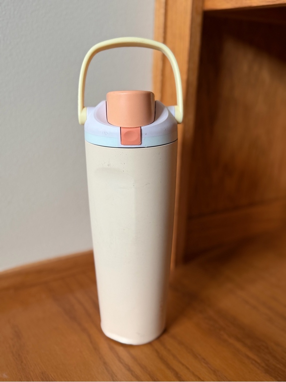 Cream Travel Tumbler with Pastel Handle and Peach Lid